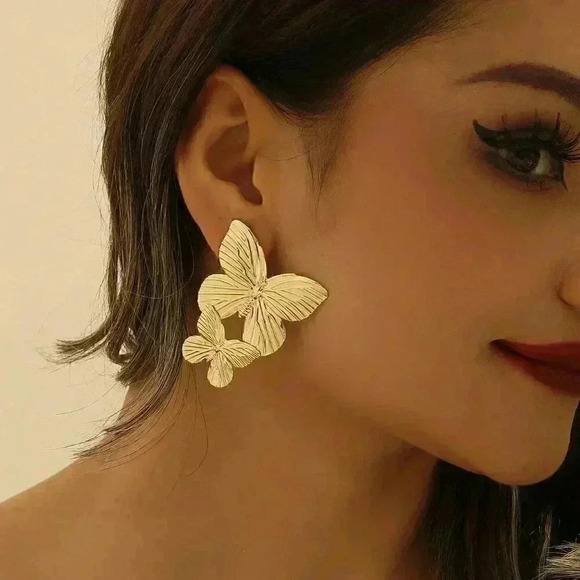 Women's Gold toned Butterfly Stud Earrings - Picture 1 of 6